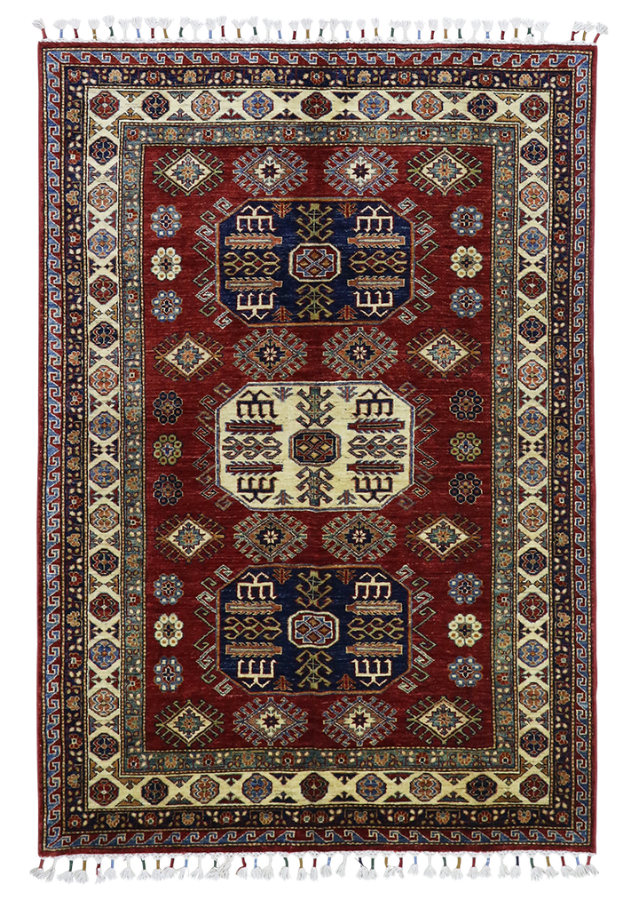 Decorative rug with intricate patterns on a plain background