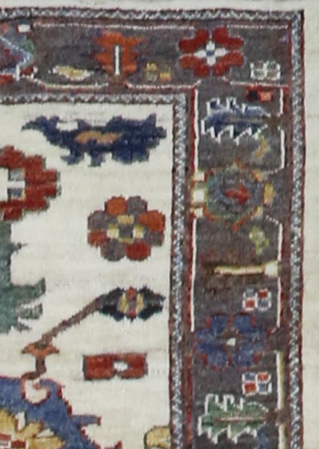 Close-up of a patterned rug with geometric designs.