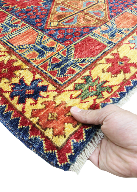 Geometric Plum Tribal 4'7" x 6'10"