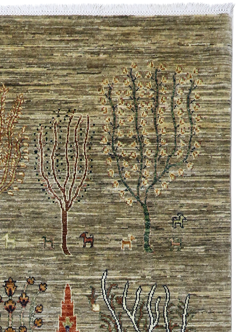 Decorative rug with tree and animal designs on a textured background